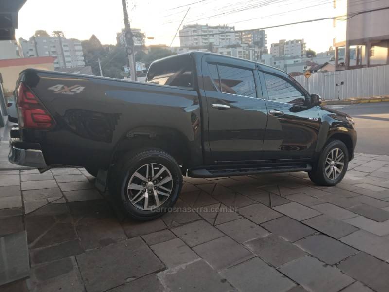 TOYOTA - HILUX - 2016/2016 - Preta - Sob Consulta