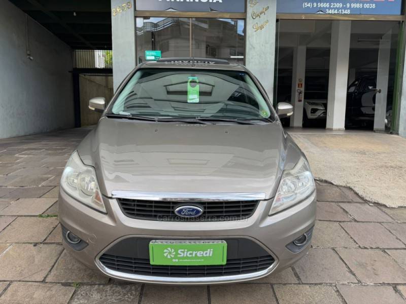 FORD - FOCUS - 2009/2009 - Dourada - R$ 48.000,00